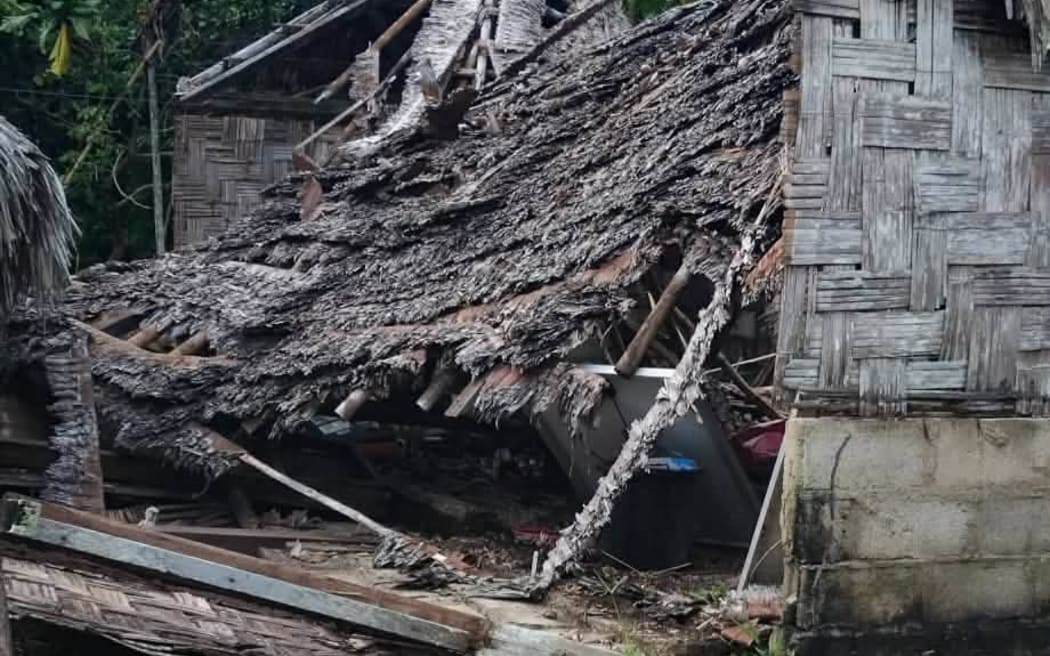 A house on Potintir, Central Malekula partially collapsed following the strong quake