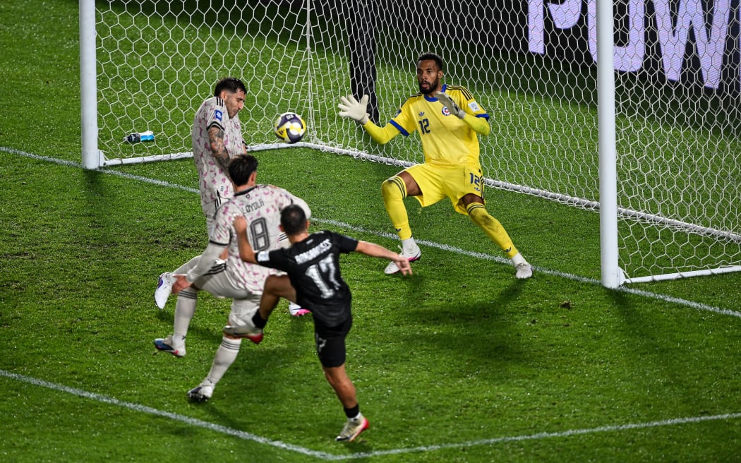 Kosta Barbarouses of New Zealand scores a goal past Goalkeeper Lawrence Vigouroux of Chile, New Zealand All Whites v Chile, FIFA series men’s international football match at Eden Park, Auckland, New Zealand on Monday 30 March 2026.
© Photo: Andrew Cornaga / Photosport