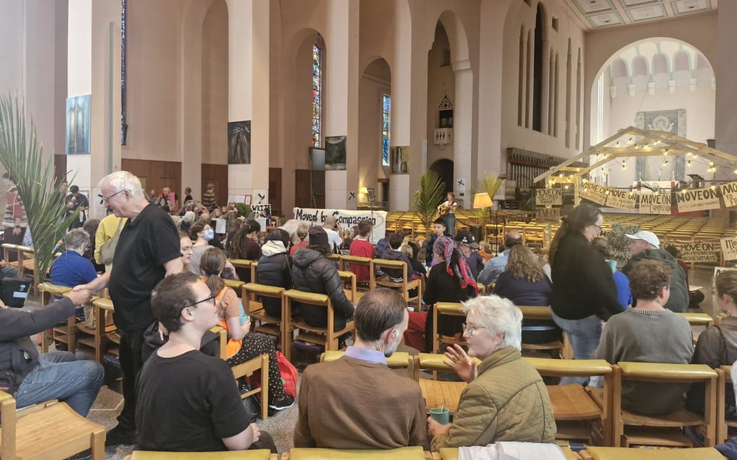 About 250 people are at an overnight vigil at Wellington's St Paul Cathedral to protest the government's plan to introduce move-on orders.