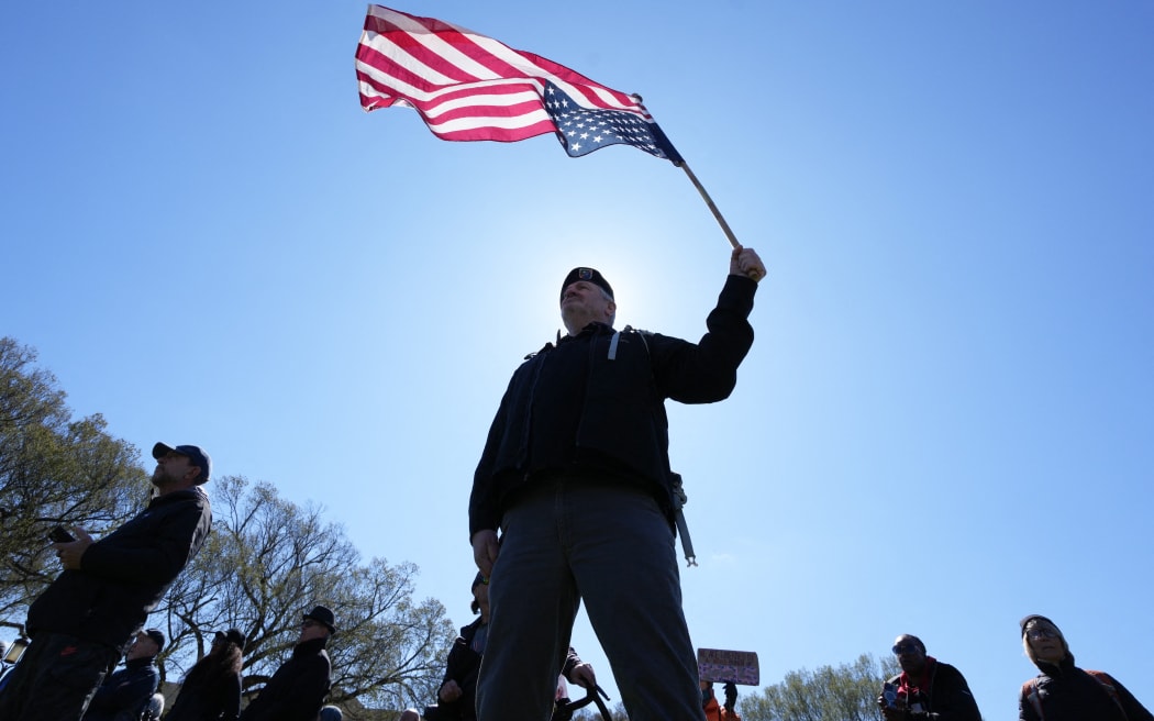 Demonstrators participate in the 