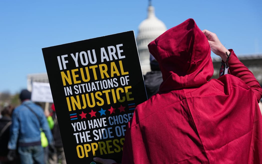 Demonstrators participate in the 