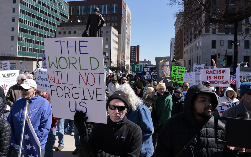 Demonstrators take part in the 