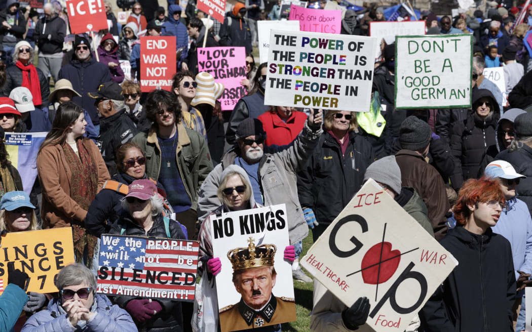 Demonstrators take part in the 