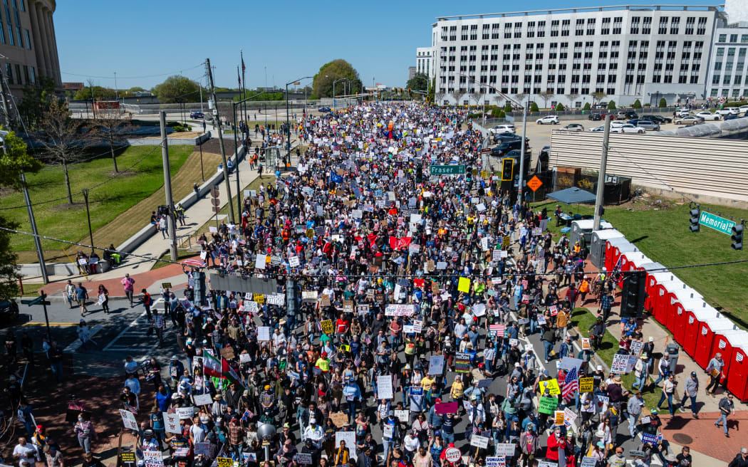 An aerial view shows people marching near the Georgia state Capitol building during the 