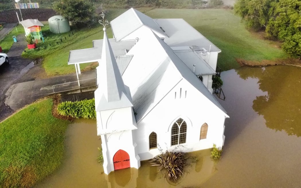 Water is receding and the sun is out in Kāeo, in Northland, this morning. State Highway 10 has reopened just north of the town, restoring road access to Kaitāia and the top of the Far North.