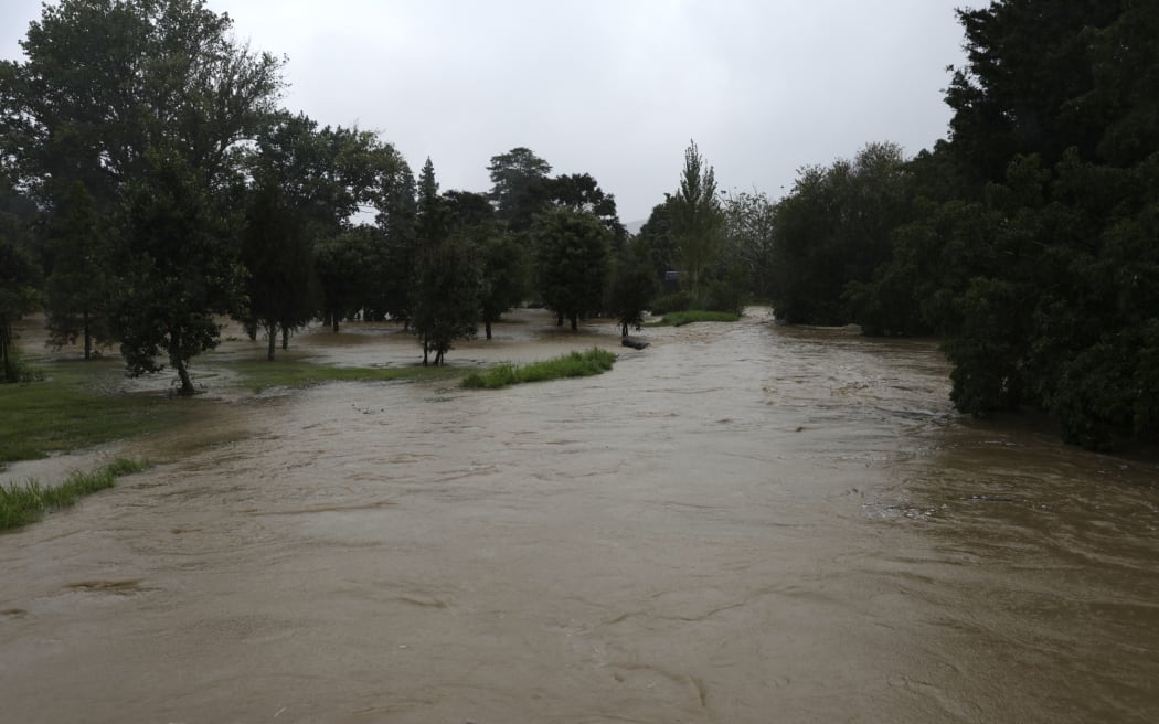 The Word War I Memorial Forest in Whangamata is under water on March 27 with the Waikiekie Stream fast flowing and brown after heavy rain in Northland. Storm, weather, flooding, floods, Northland.