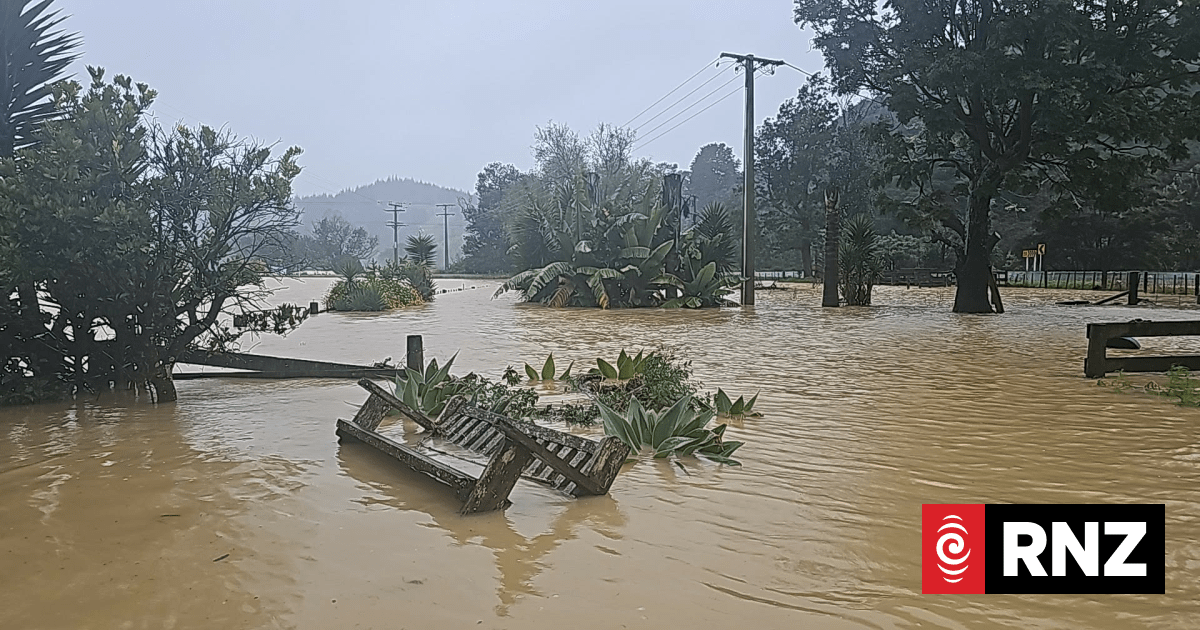 Woman, two young children rescued from car trapped in rising flood water