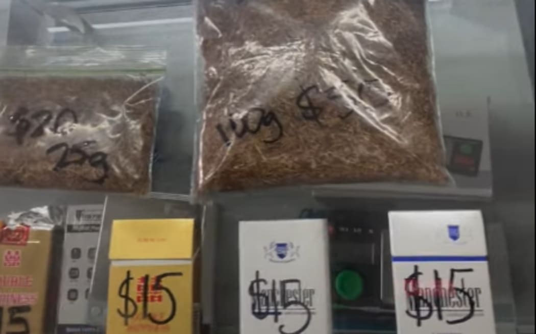 A screenshot of a video taken inside a convenience store in East Auckland that has been posted on Facebook.