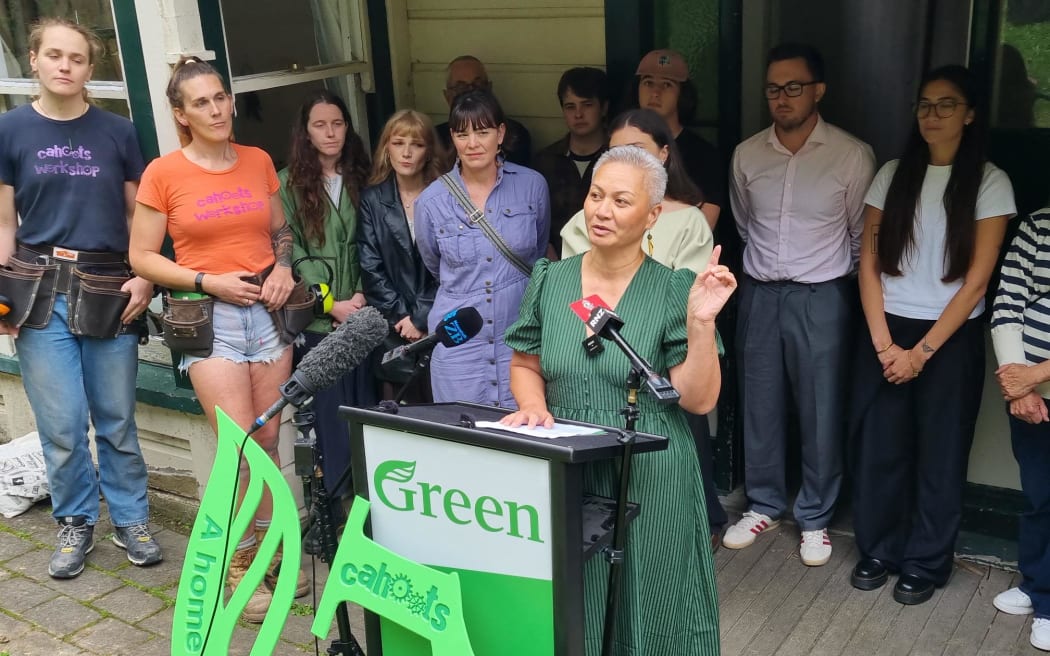 Green Party co-leaders shown round a Wellington flat and announcing housing policy