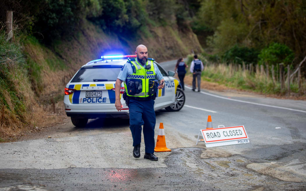 Emergency services are at the scene of a crash that's left a car upside down in a stream in rural Wellington on 25 March.