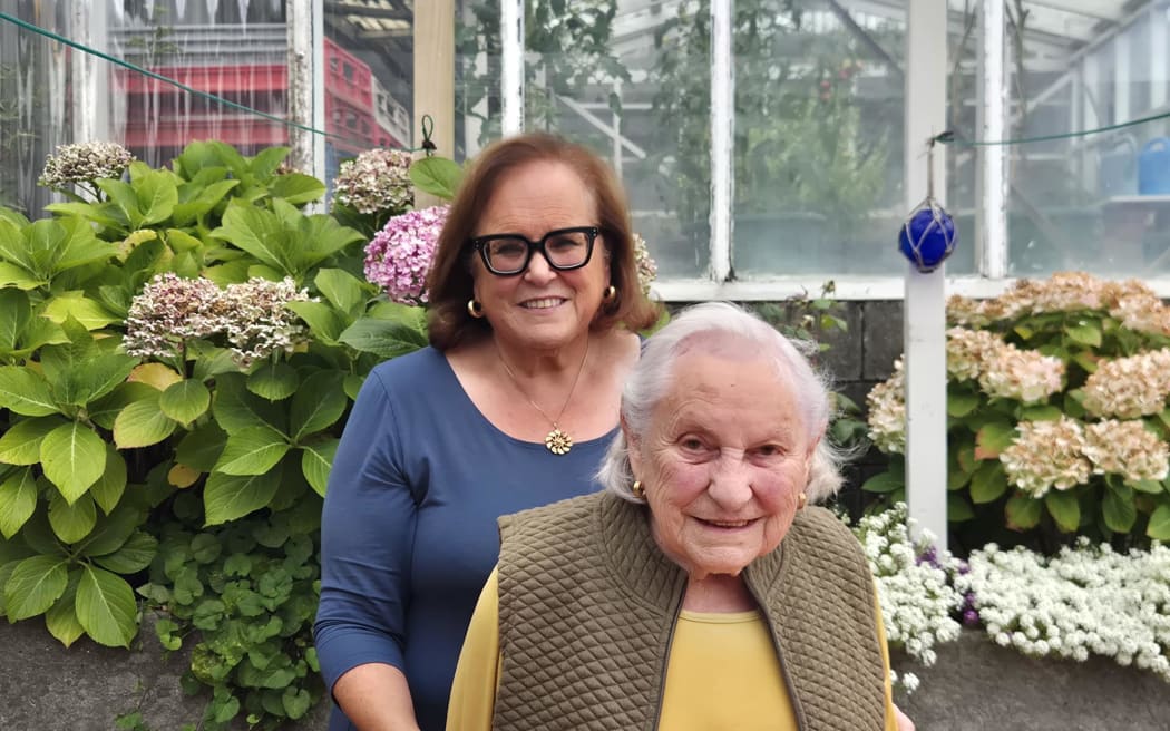 Nina Cuccurullo and mother Teresa Cuccurullo, who continue the family legacy of growing capri tomatoes first brought back from Italy by Teresa's father in the 1960s.