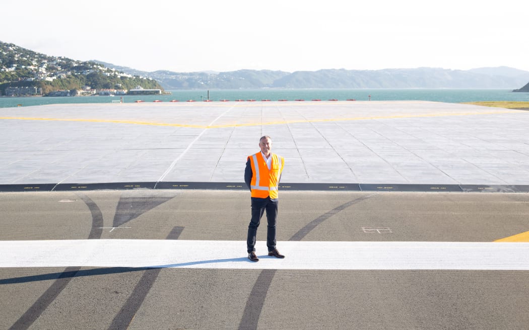 Wellington Airport chief executive Matt Clarke next to the completed EMAS bed.