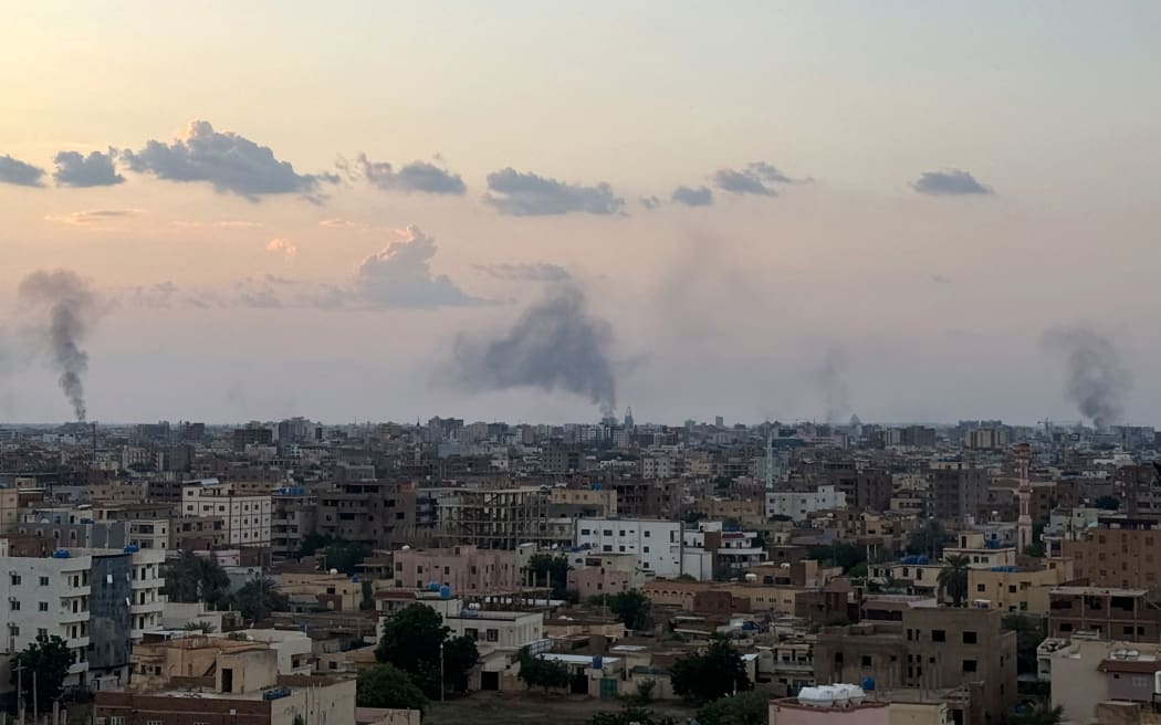 Smoke billows during air strikes in central Khartoum as the Sudanese army attacks positions held by the paramilitary Rapid Support Forces (RSF) throughout the Sudanese capital on October 12, 2024. Fierce fighting has raged since October 11 around Khartoum, much of which is controlled by the RSF, with the military pounding the centre and south of the city from the air. (Photo by AFP)