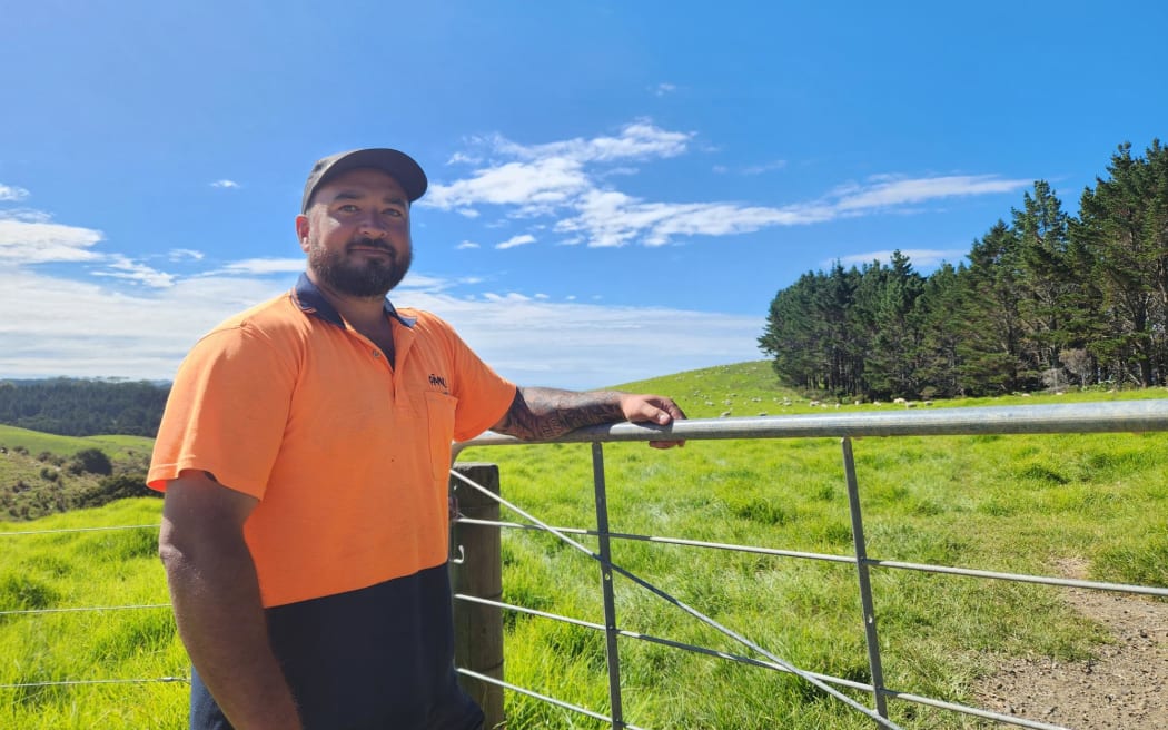 Ian Leaf leaning on farm gate