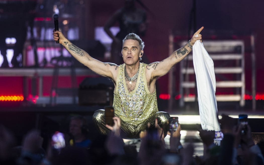 British singer-songwriter Robbie Williams performs at the Heartland Festival in Kvaerndrup, Denmark on June 10, 2023.