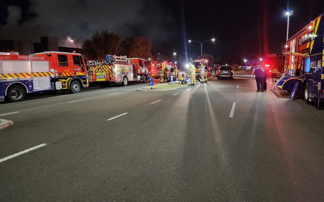 Eight fire trucks are working to extinguish a building fire in Palmerston North.