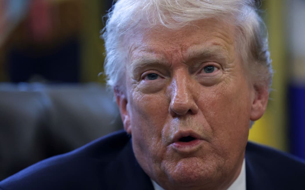 WASHINGTON, DC - MARCH 16: U.S. President Donald Trump speaks to the media after signing a document during a White House signing ceremony in the Oval Office of the White House on March 16, 2026 in Washington, DC. Trump signed an executive order to create a task force on fraud which will be lead by Vice President J.D. Vance. Alex Wong/Getty Images/AFP (Photo by ALEX WONG / GETTY IMAGES NORTH AMERICA / Getty Images via AFP)