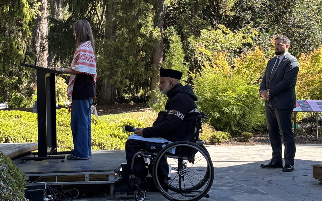 Izzah Harron and uncle Farid Ahmed read the names of Christchurch mosque attack victims, as the Peace Bell tolls 51 times.