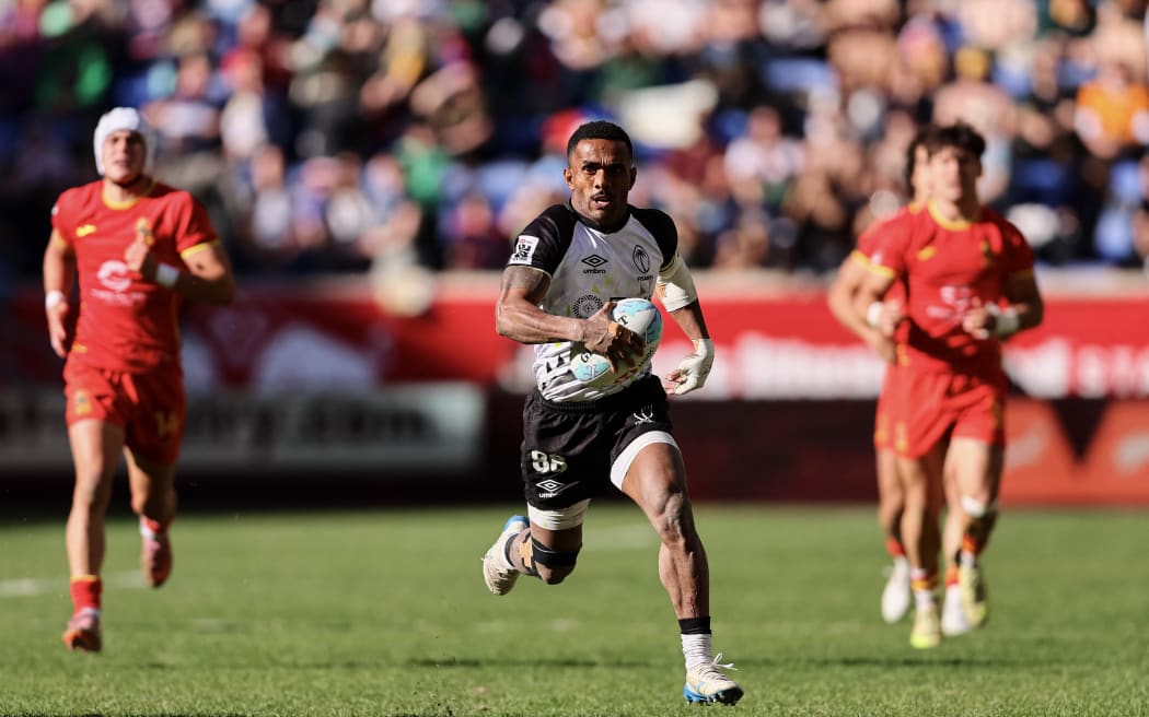 HARRISON, NEW JERSEY - MARCH 14: Terio Veilawa #88 of Fiji carries the ball against Spain during a pool play match in the HSBC SVNS Series New York at Sports Illustrated Stadium on March 14, 2026 in Harrison, New Jersey. Caean Couto/Getty Images/AFP (Photo by Caean Couto / GETTY IMAGES NORTH AMERICA / Getty Images via AFP)