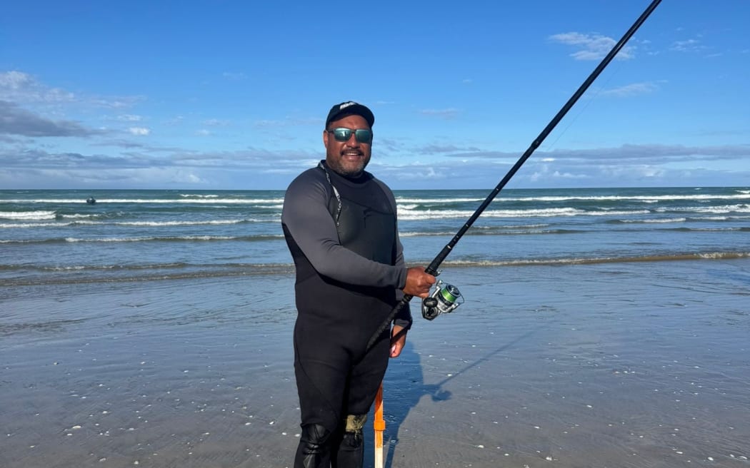 Harley Ra takes a break from fishing during the Ninety Mile Beach Snapper Bonanza.