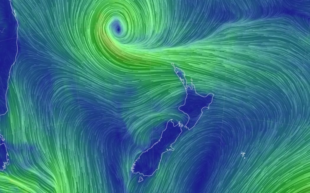 Strong winds, heavy rain loom as a tropical low nears New Zealand.