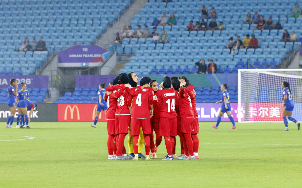 Iranian players huddle before the AFC Women’s Asian Cup Australia 2026 football match between Iran and the Philippines on the Gold Coast on March 8, 2026. (Photo by AFP) / -- IMAGE RESTRICTED TO EDITORIAL USE - STRICTLY NO COMMERCIAL USE --