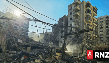 Iran says can fight for months as Israel strikes Beirut hotel