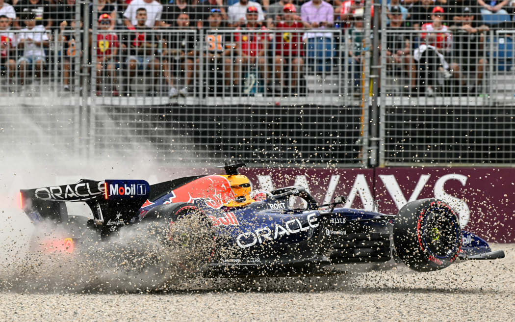 Red Bull Racing's Dutch driver Max Verstappen crashes during the qualifying session of the Formula One Australian Grand Prix.