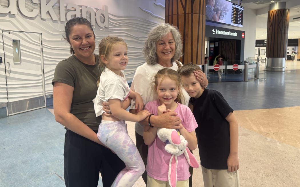 Claire Eadie, her daughter-in-law Rebecca Fleming, and three grandchildren.