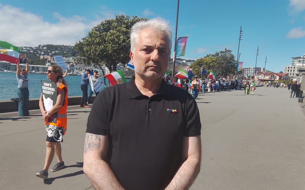 Dr Reza Farhour, a Wellington-based general practitioner originally from Iran, at a protest by Iranians and their supporters in Wellington, to show support for those in Iran living under repression. Near Frank Kitts Park, on Saturday 7 March, 2026.