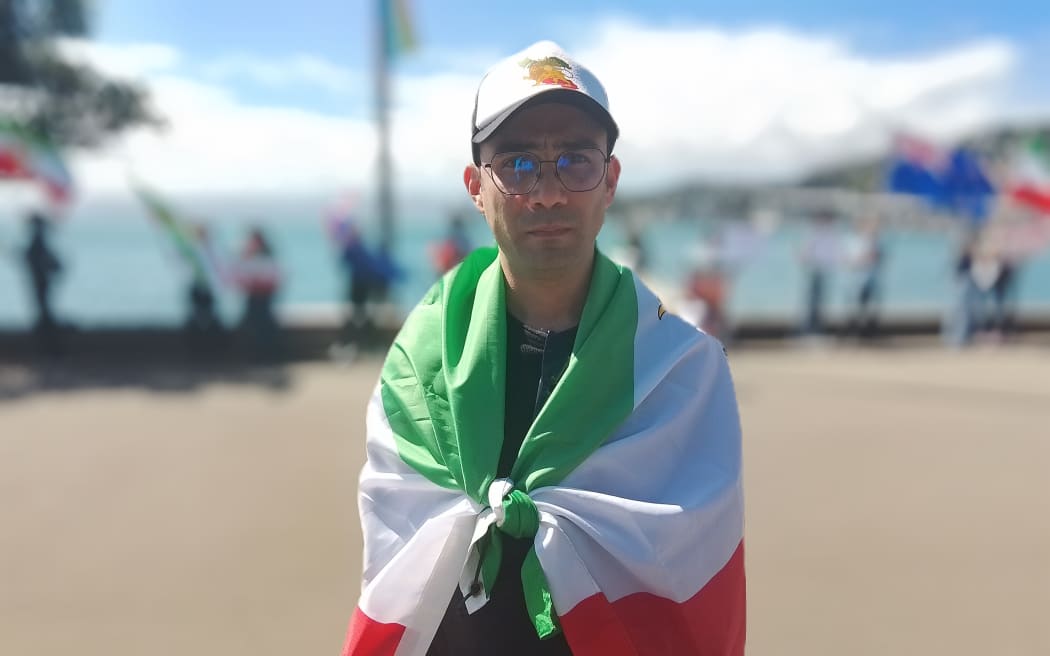 Ali Jafari-Gh, an Iranian-born academic who teaches at Massey University, at a protest by Iranians and their supporters in Wellington, to show support for those in Iran living under repression. Near Frank Kitts Park, on Saturday 7 March, 2026.