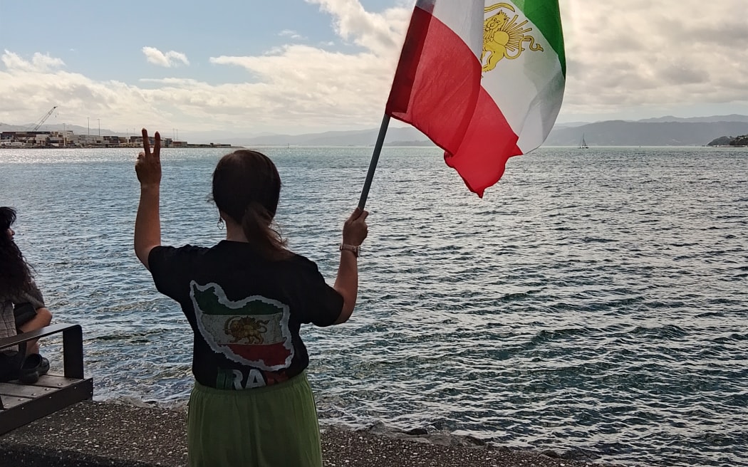 Shirin, who has lived in New Zealand for 13 years after leaving Iran, at a protest by Iranians and their supporters in Wellington, to show support for those in Iran living under repression. Near Frank Kitts Park, on Saturday 7 March, 2026.
