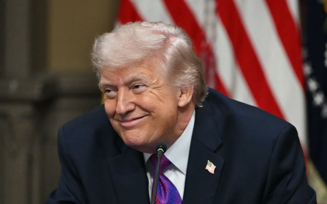 US President Donald Trump smiles during a roundtable on Ratepayer Protection Pledge in the Indian Treaty Room at the Eisenhower Executive Office Building on the White House campus in Washington, DC, on March 4, 2026.