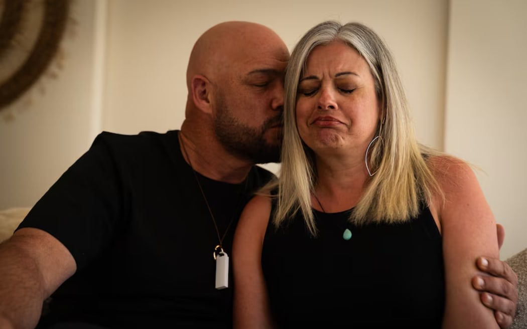 Angela and Todd James are calling on the state government to increase warnings about the danger of dingoes during peak periods on K'gari.