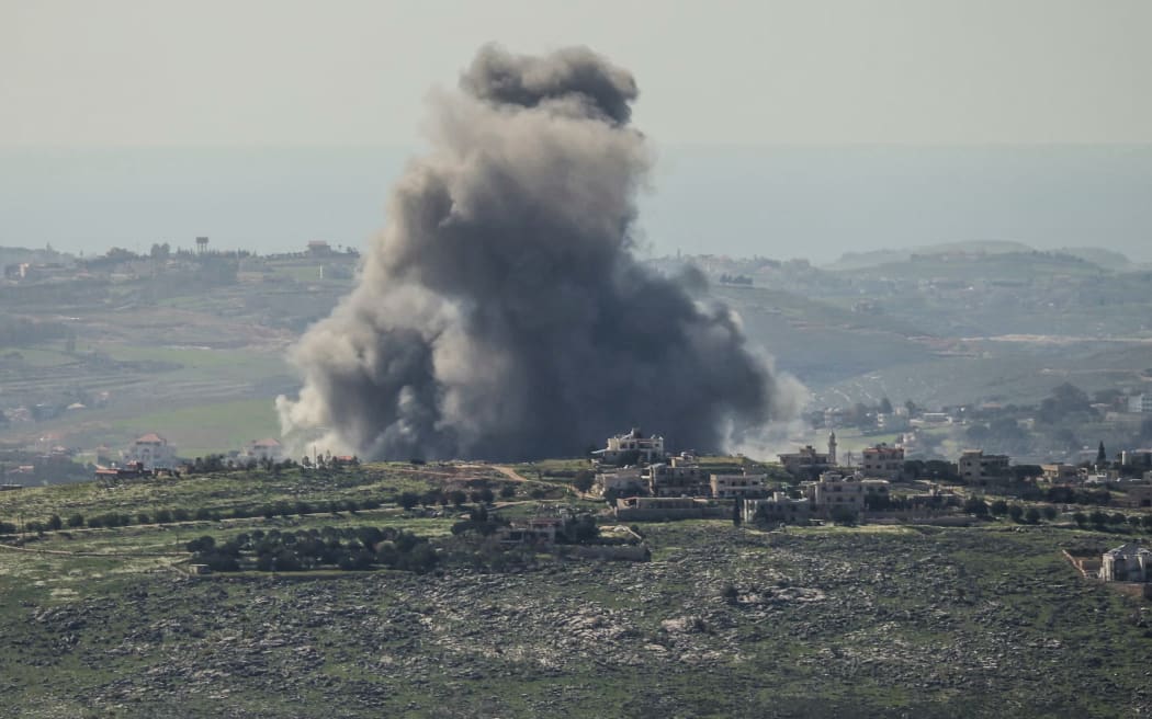 Smoke rises from the site of an Israeli airstrike that targeted the southern Lebanese village of Kfar Tibnit on March 5, 2026. Lebanon was drawn into the Middle East war on March 2, when Hezbollah attacked Israel in response to the killing of the Iranian supreme leader during US-Israeli strikes over the weekend. (Photo by Rabih DAHER / AFP)