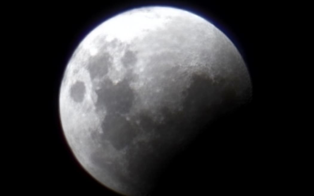 On the way to the total eclipse, as seen from Karaka in South Auckland.
