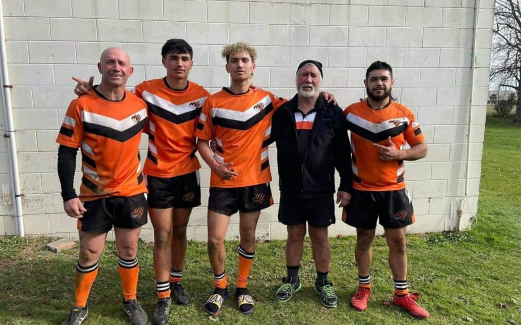 Jason Walker (far left) and Ernie Walker (second from right) have been leading the charge to return the clubhouse to use.