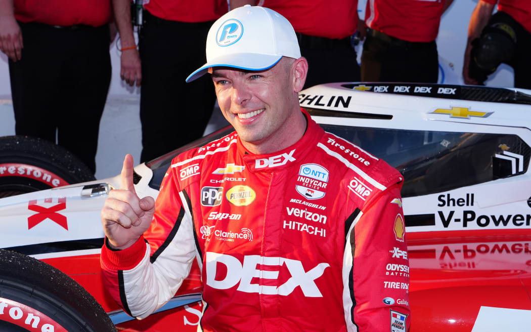 IndyCar series driver Scott McLaughlin (3) holds up a number one after being the fastest qualifier for the Firestone Grand Prix of St. Petersburg.