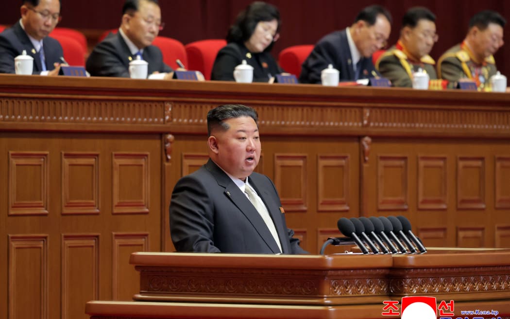 This picture taken on February 19, 2026 and released by North Korea's official Korean Central News Agency (KCNA) on February 20, 2026 shows North Korean leader Kim Jong Un delivering the opening address at the Ninth Congress of the Workers' Party of Korea in Pyongyang. (Photo by KCNA VIA KNS / AFP) / South Korea OUT / SOUTH KOREA OUT / ---EDITORS NOTE--- RESTRICTED TO EDITORIAL USE - MANDATORY CREDIT "AFP PHOTO/KCNA VIA KNS" - NO MARKETING NO ADVERTISING CAMPAIGNS - DISTRIBUTED AS A SERVICE TO CLIENTS
THIS PICTURE WAS MADE AVAILABLE BY A THIRD PARTY. AFP CAN NOT INDEPENDENTLY VERIFY THE AUTHENTICITY, LOCATION, DATE AND CONTENT OF THIS IMAGE. /