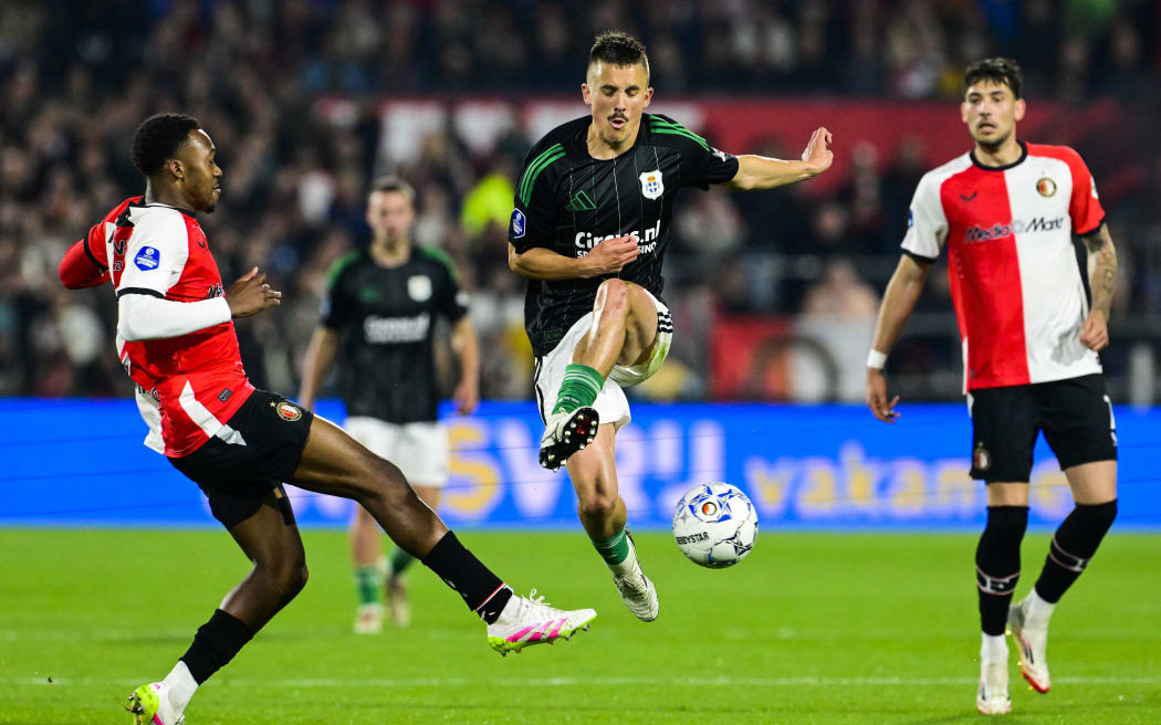 All Whites midfielder Ryan Thomas, centre, in action for PEC Zwolle against Feyenoord in the Dutch Eredivise competition, 25 April, 2025.  (Photo by Olaf Kraak / ANP / AFP).