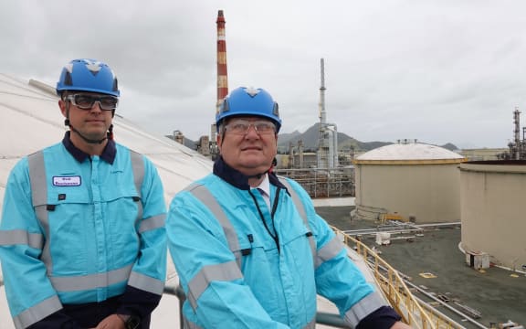 Channel Infrastructure chief executive Rob Buchanan and Regional Development Minister Shane Jones atop a 30-million-litre jet fuel tank.