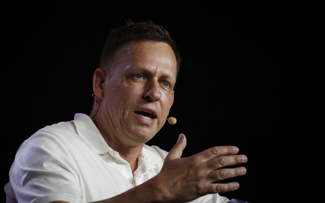 MIAMI, FLORIDA - APRIL 7: Peter Thiel, co-founder of PayPal, Palantir Technologies, and Founders Fund, gestures as he speaks during the Bitcoin 2022 Conference at Miami Beach Convention Center on April 7, 2022 in Miami, Florida. The worlds largest bitcoin conference runs from April 6-9, expecting over 30,000 people in attendance and over 7 million live stream viewers worldwide.  Marco Bello/Getty Images/AFP (Photo by Marco Bello / GETTY IMAGES NORTH AMERICA / Getty Images via AFP)