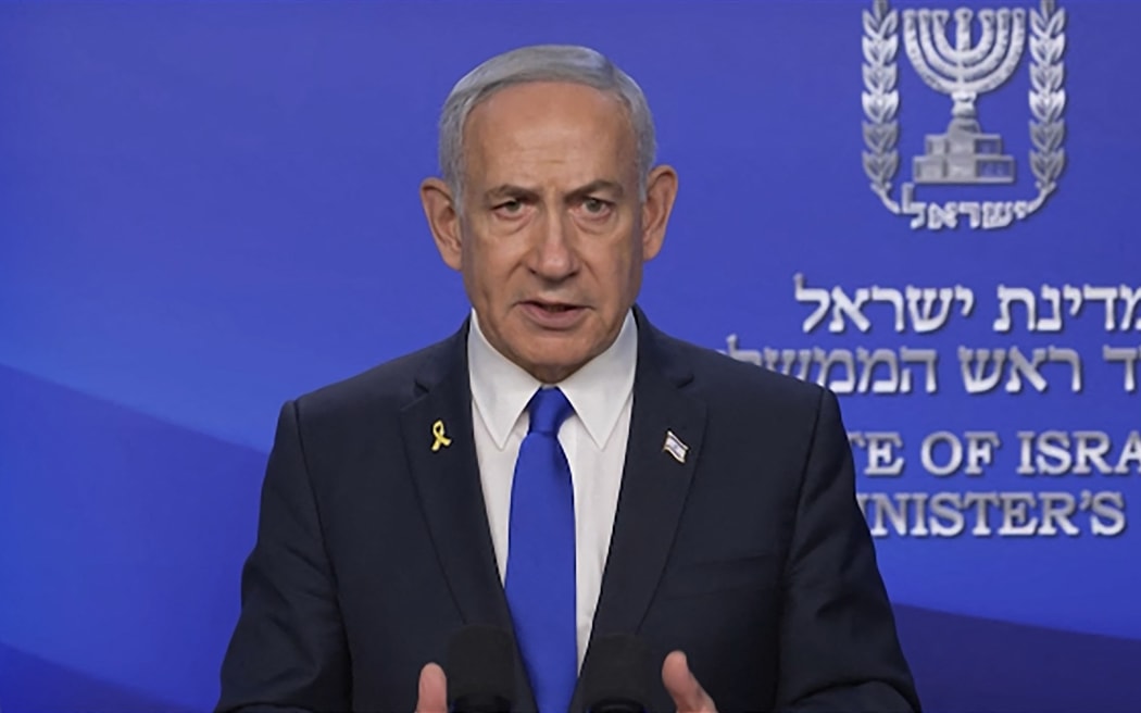 This image grab from a video released by the Israeli Government Press Office (GPO) shows Israel's Prime Minister Benjamin Netanyahu announcing the launch of a targeted military operation against Iran in a video statement on June 13, 2025. Netanyahu said the country's strikes against Iran would "continue for as many days as it takes" after Israel announced it had carried out strikes on Iran. (Photo by GPO / AFP) / Israel OUT / ISRAEL OUT / ISRAEL OUT / RESTRICTED TO EDITORIAL USE - MANDATORY CREDIT "AFP PHOTO / HANDOUT / GPO" - NO MARKETING NO ADVERTISING CAMPAIGNS - DISTRIBUTED AS A SERVICE TO CLIENTS