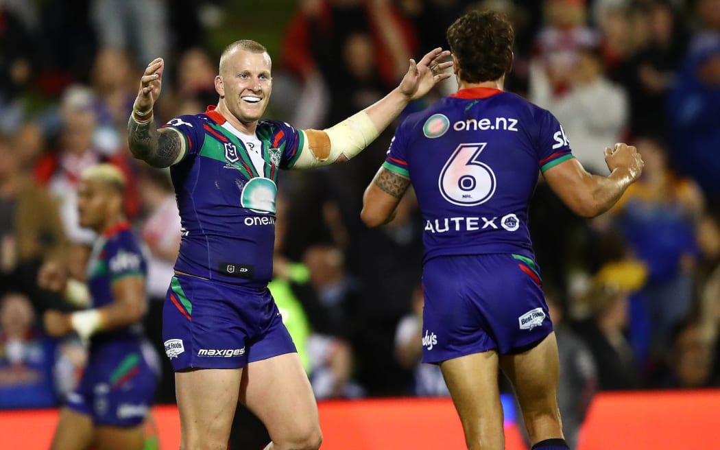 Mitchell Barnett (captain) of the Warriors celebrates after the match, Dragons v Warriors.