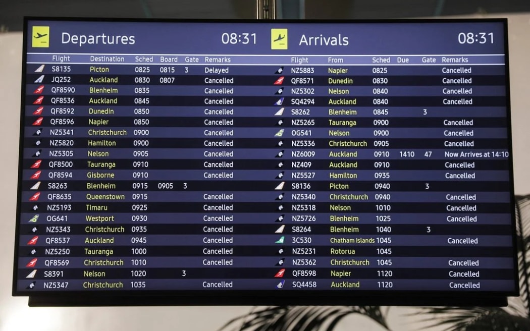 The flight information board at Wellington Airport. Flights are cancelled in and out of the capital till at least midday.