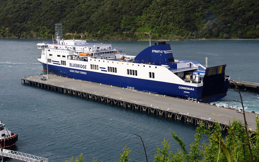 Bluebridge ferry the Connemara berthing at Picton wharf, helped by a tug, after earlier hitting the wharf while attempting to berth.