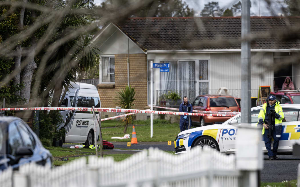Police at the scene of a fatal shooting incident on Marvon Downs Avenue in Pakuranga. The white van is a focus of the investigation.19 August 2024.New Zealand Herald photograph by Jason Oxenham