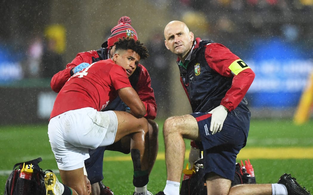 Anthony Watson receives medical attention during the second test against the All Blacks in 2017.