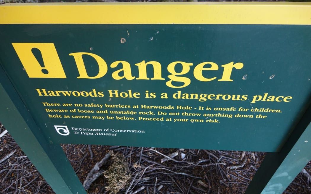 Harwoods Hole warning sign