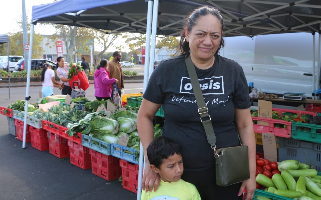 South Auckland woman Doreen with her son at Mangere markets.
